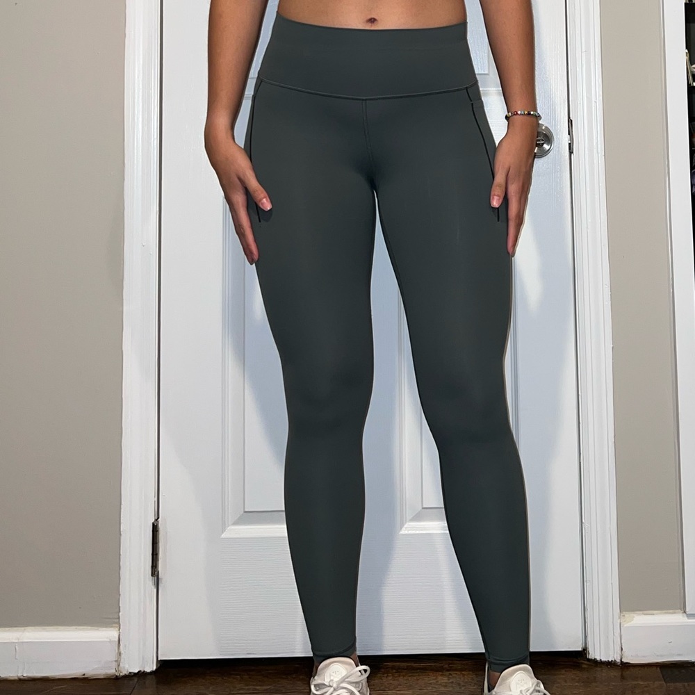 Athleta Transcend Stash Tight in Bali Green